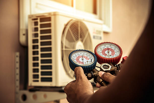 Professional Ac Installation technician working in Morrisonville, IL